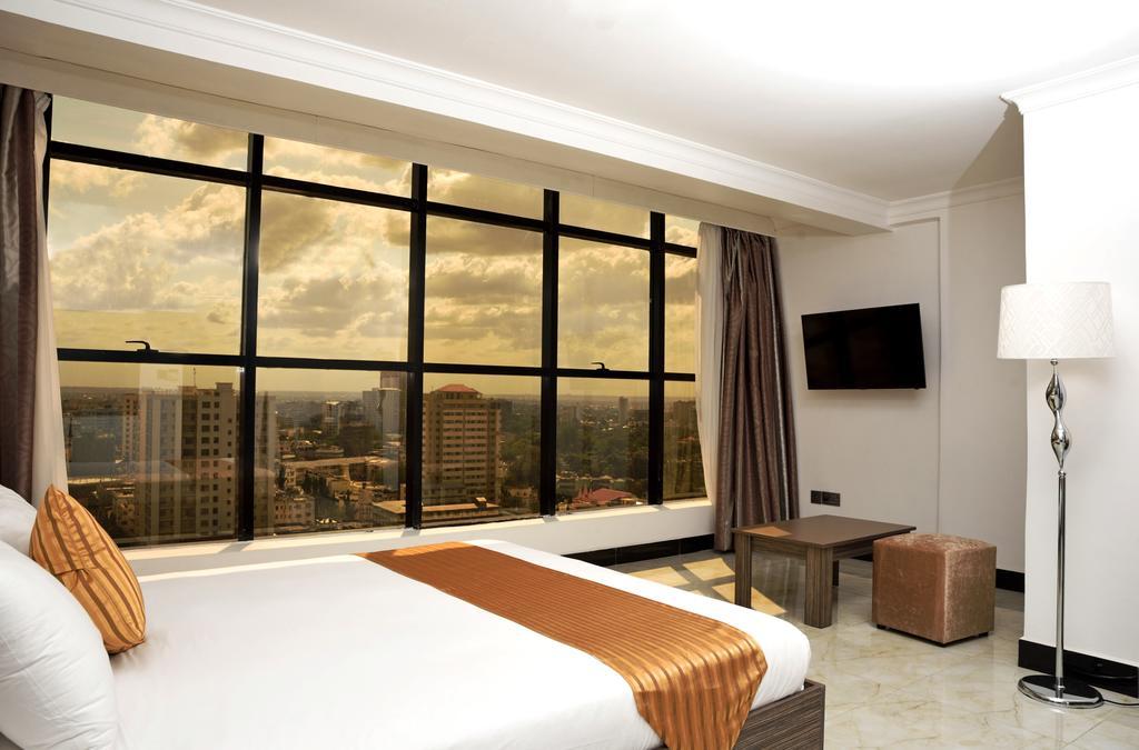 Golden Tulip Dar Es Salaam City Center Hotel Стая снимка